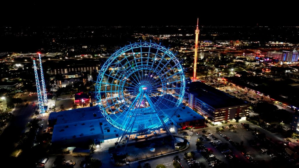 Ferris Wheel In Orlando Florida United States. Aerial View Of Exciting Amusement Park Perfect For Family Fun. Building Metropole Skyline Buildings Beautiful. Buildings Flyover Night. Orlando Florida. Ferris Wheel In Orlando Florida United States.